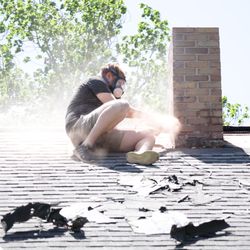 Friendly Fire - Grinding out joints to re-tuck a chimney.
