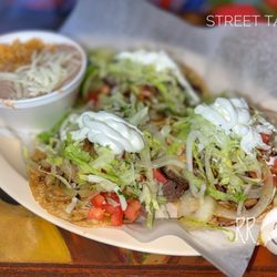 El Taco Jalisco - Lengua, shredded beef & carnitas tacos with upcharge for lettuce, tomatoes, sour cream & grilled onions (w/rice & beans)