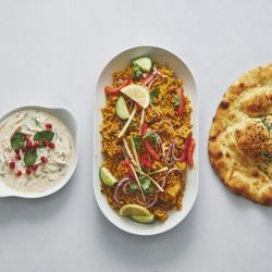 Shahi Indian Restaurant - Chicken biryani, nan bread ,raita.