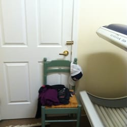 Boston Hair Design and Tanning - the lock on the door didn't work so I held it closed with this chair...