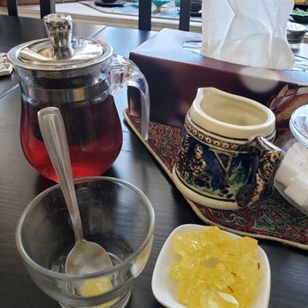 Lotus Cafe - Borage tea with saffron sweetner cubes - Middle Eastern Near Me - Edmonton, Alberta Lotus Cafe - Borage tea with saffron sweetner cubes - Middle Eastern Near Me - Edmonton, Alberta