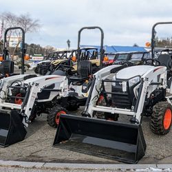 Friend & Friend - Lining up the new Bobcat Compact Tractors.