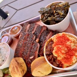 Pork ribs , greens, potato salad, Mac and beans Pork ribs , greens, potato salad, Mac and beans