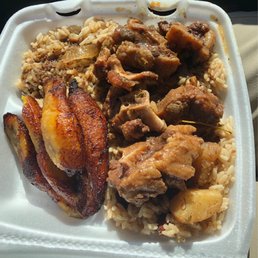 Oxtail, plantains, and rice. Soooo good.