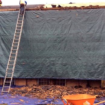 Durable Roofing Solutions - Pilgrim Congregational Church - During Shingle Tear off - Flat & Steep Roof Replacement - Roofing Near Me - Milwaukee, Wisconsin