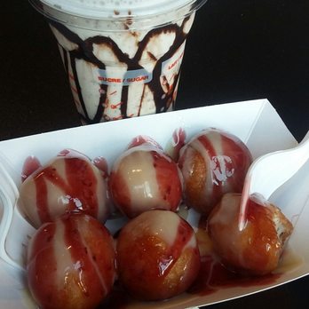 Mr. Puff's - Choco raspberry puffs with kit kat milkshake in the background - Food Trucks Near Me Mr. Puff's - Choco raspberry puffs with kit kat milkshake in the background - Food Trucks Near Me