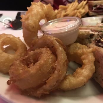 The Players Retreat - Beer batter hand cut onion rings with a tangy Mayo sauce on the side - Sports Bars Near Me - Raleigh, North Carolina The Players Retreat - Beer batter hand cut onion rings with a tangy Mayo sauce on the side - Sports Bars Near Me - Raleigh, North Carolina
