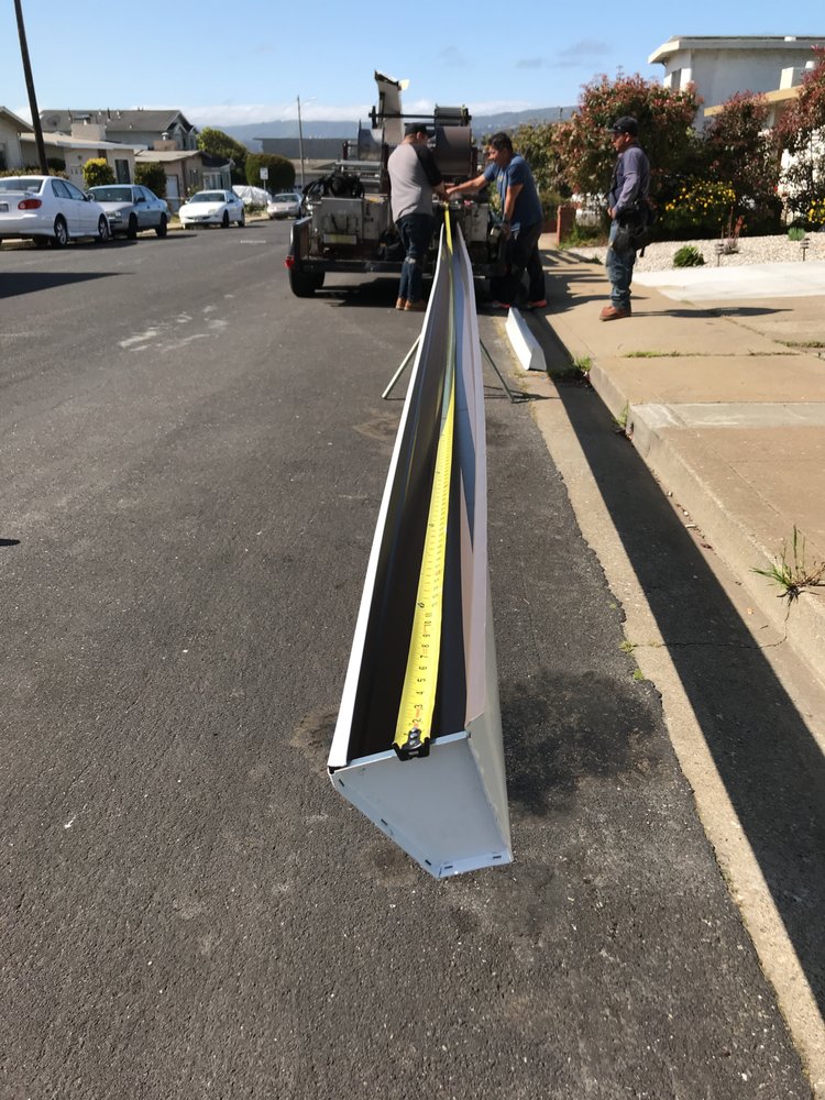 Slide of Caruzo's Roofing Contractors