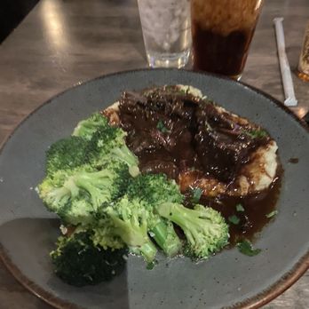 Virtue Feed & Grain - Braised beef rib and mashed potatoes - Bars Near Me - Alexandria, Virginia Virtue Feed & Grain - Braised beef rib and mashed potatoes - Bars Near Me - Alexandria, Virginia