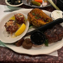 Filet, bacon wrapped scallops, loaded baked potato