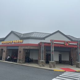 Exterior outside entrance of Torchy's Tacos - Storefront - Rockville, Maryland Exterior outside entrance of Torchy's Tacos - Storefront - Rockville, Maryland