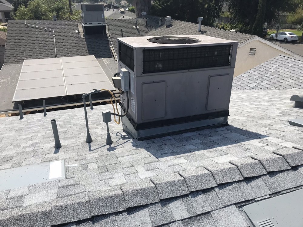 Slide of Armandos Roofing