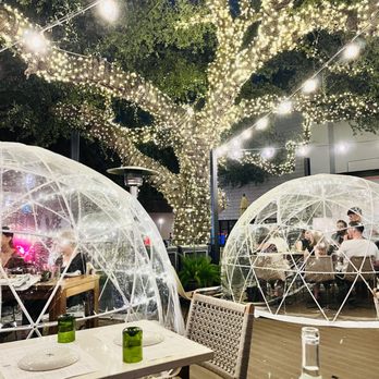 Sixty Vines - The outdoor patio and igloo experience - New American Near Me - Austin, Texas