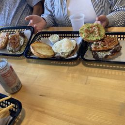 Burger on the right lucha liner burger in the middle su no burger and at the left gladiator burger