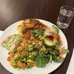 Annayu - Buffet for delayed flight passengers: Beef stew with mashed potatoes, steamed veggies, lasagna, and salad bar