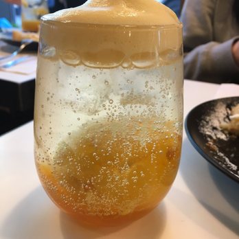 Spot Dessert Bar - Mango soda- passion fruit foam, soda and ball of frozen mango purée/cream like substance - Desserts Near Me - Flushing, New York Spot Dessert Bar - Mango soda- passion fruit foam, soda and ball of frozen mango purée/cream like substance - Desserts Near Me - Flushing, New York