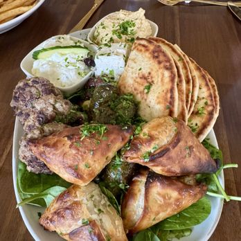 Hellenic - Meze Board So much yum. Beefteki, spanakopita, dolmades, tzaziki, hummus, olives, pita - Greek Near Me - Coral Springs, Florida Hellenic - Meze Board So much yum. Beefteki, spanakopita, dolmades, tzaziki, hummus, olives, pita - Greek Near Me - Coral Springs, Florida