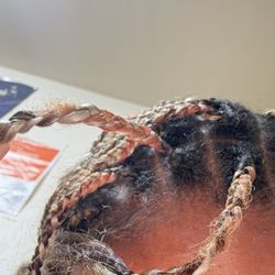Beyond Braids Beauty Bar - The hair sticking out of the braid after 2 weeks only.