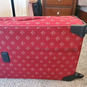Alaska Airlines - My New luggage that has been used 3 times. Ripped and was soaked with rain that my clothes and everything inside was damp. - Airlines Near Me - Dallas, Texas
