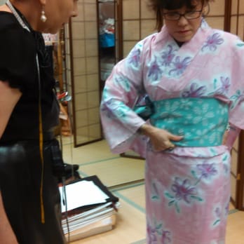 Kimono no Kobeya - Teaching me how to appropriately grab the Obi and slide it around to my back. We shared an inside joke about Obi's being tied in front^^ - Traditional Clothing Near Me - Pasadena, California