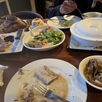 Gerry's Grill - Pork Knuckle top left, then the garlic rice, tuna belly, short rib sinigang - Filipino Near Me - Artesia, California Gerry's Grill - Pork Knuckle top left, then the garlic rice, tuna belly, short rib sinigang - Filipino Near Me - Artesia, California
