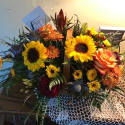 Bouquet Florist & Gift Shoppe - Beautiful fall arrangement loaded with a variety of flowers and greenery.