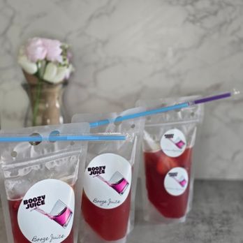 Boozy Juice - Seminole Breeze is one of our custom cocktails. - Bartenders Near Me