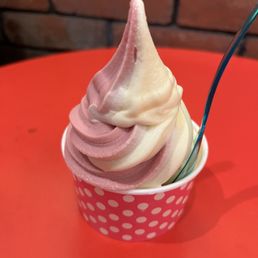 Dole Whip pineapple and raspberry swirl . Dole Whip pineapple and raspberry swirl .