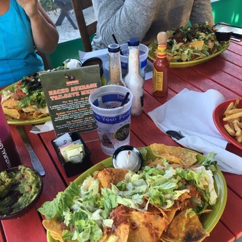 Nacho Hippo - Naked nachos (w/ chili) in front, hungry hippo, and day after nachos in the back - Mexican Near Me - North Myrtle Beach, South Carolina Nacho Hippo - Naked nachos (w/ chili) in front, hungry hippo, and day after nachos in the back - Mexican Near Me - North Myrtle Beach, South Carolina