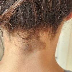 Liz's Hair Spa & Waxing - Dye on my skin after several times asking her to clean it off.