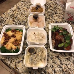China Tea House - Honey walnut shrimp, shu Mai, har gow, steamed pork bun, pork and vegetable gyoza, half duck
