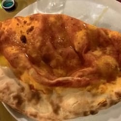 Osteria del Molino - The mother of all calzones. That's a human hand there, for comparison