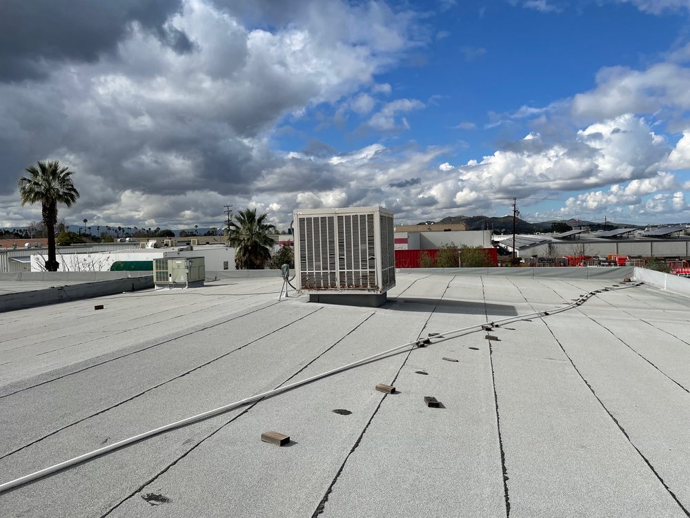 Slide of Roy O. Huffman Roof Company