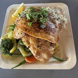 Fresh catch of the day, lightly blacked hogfish with Cole slaw and vehicles. Come hungry as portion was huge! Fresh catch of the day, lightly blacked hogfish with Cole slaw and vehicles. Come hungry as portion was huge!