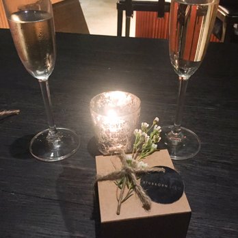 Stubborn Seed - Perfect touch to the end of our dinner, cute box tied with flowers that holds a macaroon inside. - New American Near Me - Miami Beach, Florida Stubborn Seed - Perfect touch to the end of our dinner, cute box tied with flowers that holds a macaroon inside. - New American Near Me - Miami Beach, Florida
