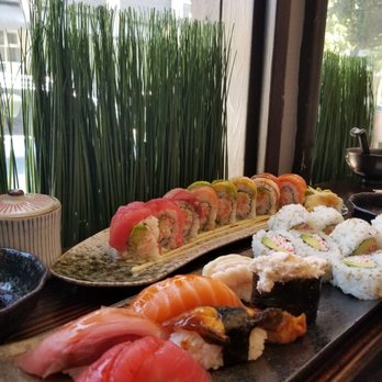 Sumo Roll - Nigiri deluxe in the front, rainbow roll in the back - Sushi Bars Near Me - Berkeley, California Sumo Roll - Nigiri deluxe in the front, rainbow roll in the back - Sushi Bars Near Me - Berkeley, California