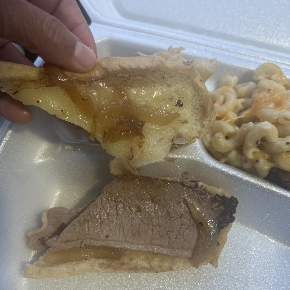 Brisket sandwich with caramelized onions. Brisket sandwich with caramelized onions.