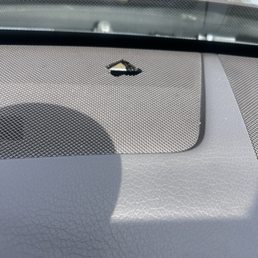 They dropped something on my speaker while fixing my windshield n lied about it They dropped something on my speaker while fixing my windshield n lied about it