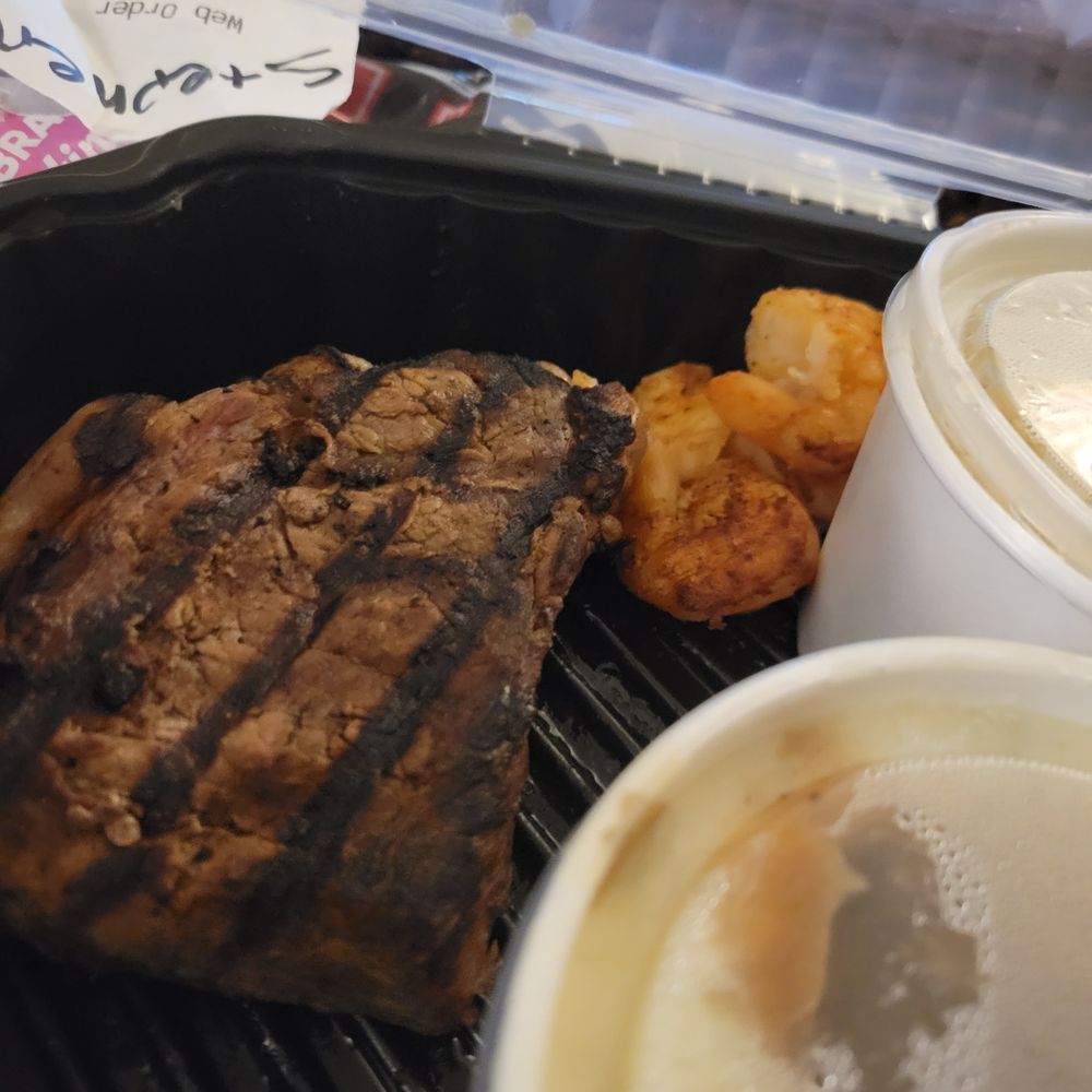 Half a steak before I cut into it Half a steak before I cut into it