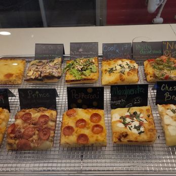 Uncle G’s Pizza - Display of all pizza types excluding thin crust, cinnamon rolls and the various cake types. Try Uncle G and thank me later. - Pizza Near Me - Hoover, Alabama
