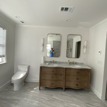 IMEDI Construction - Toilet with washlet-bidet seat, vanity and medicine cabinets - General Contractors Near Me