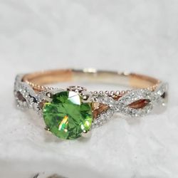 Forever Diamonds Jewelers - This is a ring that we set up with a Tsavorite garnet center.