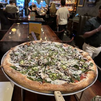 Rocco's - Customized pizza with vegan cheese, jalapeños, opinions, spinach and mushrooms - Bars Near Me - Seattle, Washington