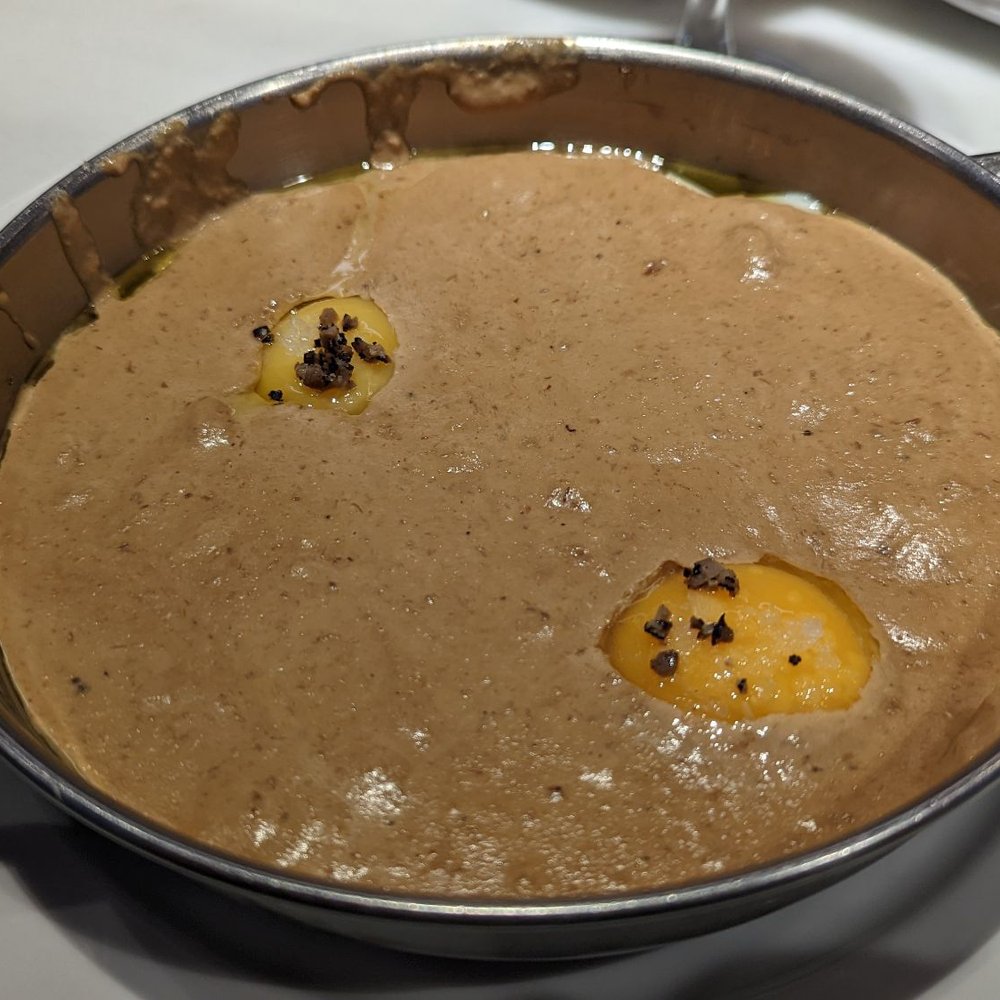 Eslava - Rural egg with boletus edulis mousse and truffle - Tapas Bars Near Me - Seville, SE Eslava - Rural egg with boletus edulis mousse and truffle - Tapas Bars Near Me - Seville, SE