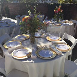 Chairs, tables, linens, and chargers all looked great!