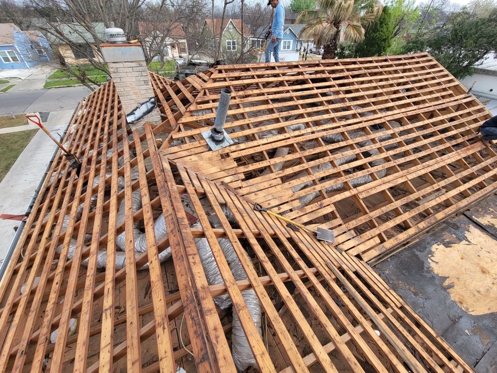 Slide of Tux Roofing