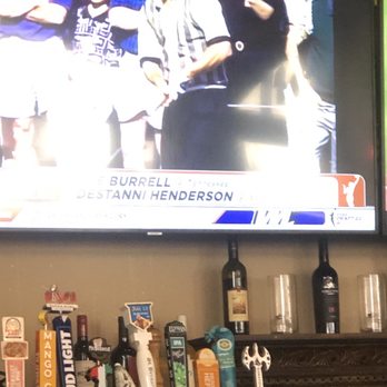Pinocchio's Pizza - Part of the bar & one of several TVs. - Pizza Near Me - Pasadena, California