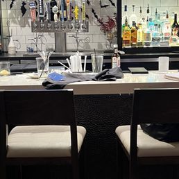 Dining around dirty dishes. Dining around dirty dishes.