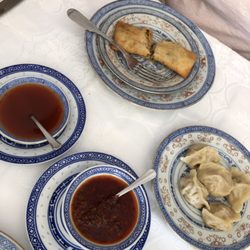 Restaurante China - Spring rolls and fried pork dumplings with sauces. (Appetizer.)