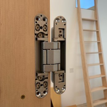 Modest House - a close up of a door hinge - General Contractors Near Me Modest House - a close up of a door hinge - General Contractors Near Me